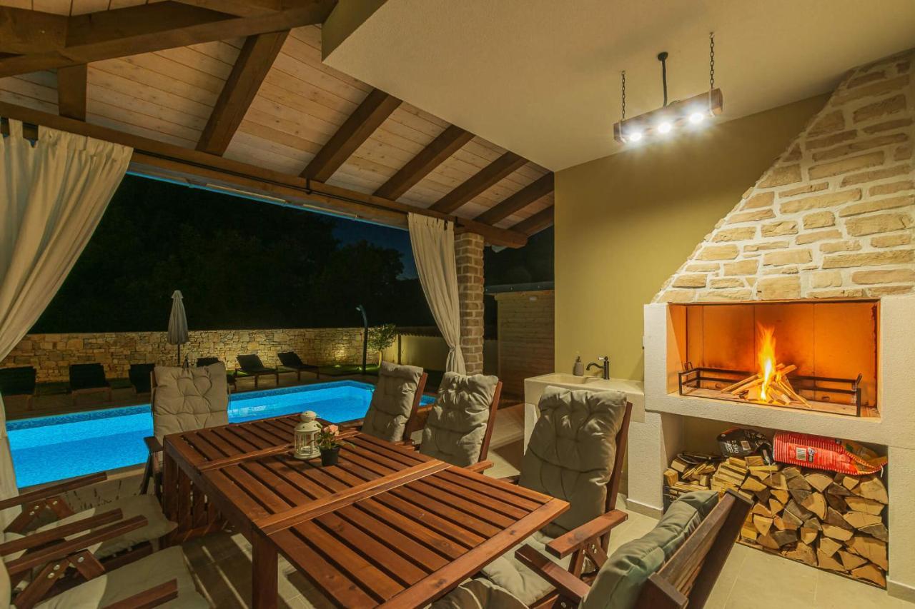 Villa David - Luxurious Secluded Villa With A Heated Pool Butkovići Exterior foto